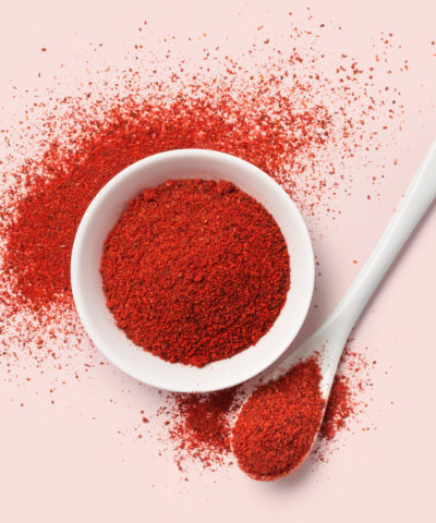 Top view of red pepper powder in bowl