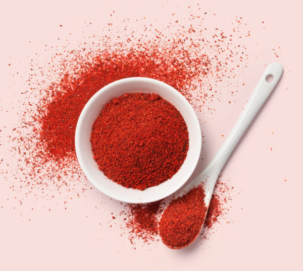 Top view of red pepper powder in bowl